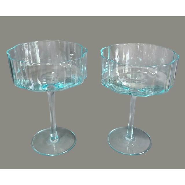 Elevate your hosting game with these vintage Mid-Century Modern scallop flower cocktail glasses. Exuding a timeless...
