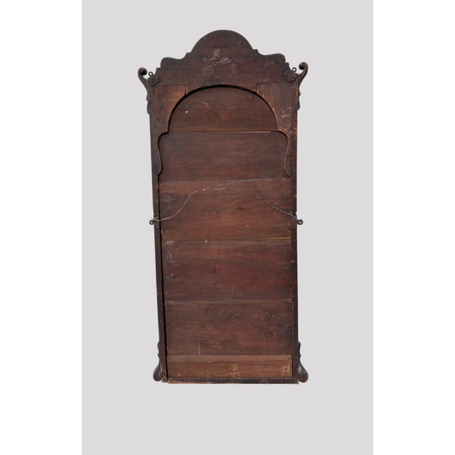 A large hard to find Walnut Wall Mirror from the George IV period. Nice wide grained walnut frame with a double scroll...