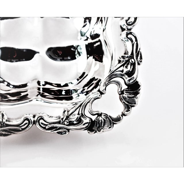 What a fabulous shape; you rarely find pieces in a square shape. The border is Classic Art Nouveau: it was inspired by...