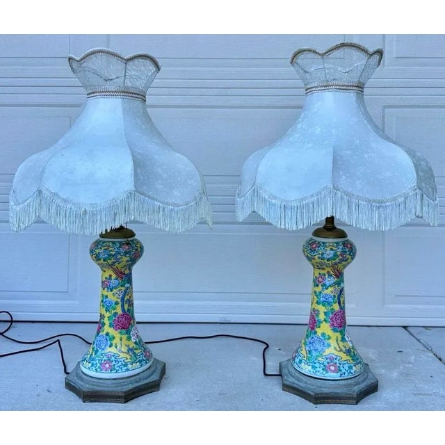 A Monumental Pair of Early 19th-Century Chinese Famille Rose Porcelain Vase Lamps with Victorian Shades An exquisite and...