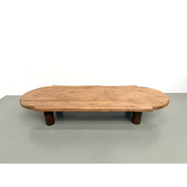Maison Lecan presents this XXL solid oak coffee table from the 1950s, a unique piece that commands attention with its...