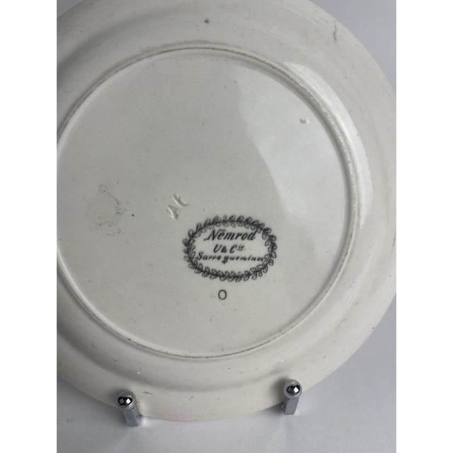 This Sarreguemines transferware plate, measuring 7 inches, is part of the "Nemrod" series, inspired by the renowned 18th-...