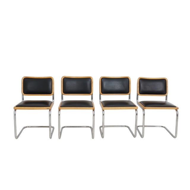 - 30.5"h, 18.25"w, 23"d, 18" seat height - Chrome, vinyl, wood - Sold as a set of 4 - Condition: Excellent