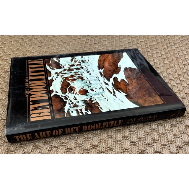Lovely hardcover coffee table book, The Art of Bev Doolittle, an artist known for her creative and renown watercolor...