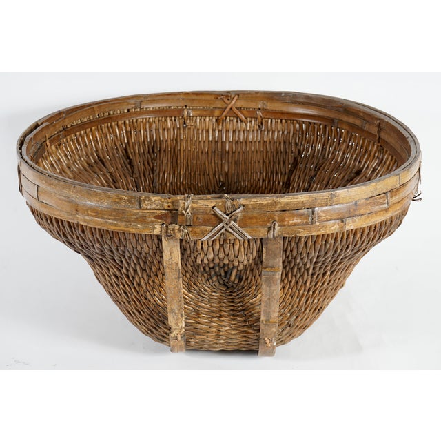 Large Vintage Chinese Handwoven Water Basket. Can be displayed in a corner of the room as a piece of art.