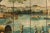 This four-panel folding screen features a hand-painted riverside scene rendered in soft yet vibrant tones. Likely produced...