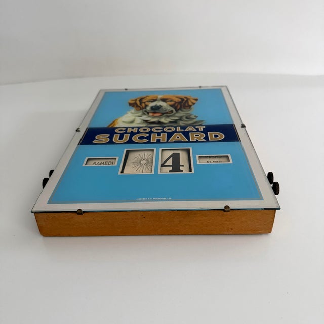 Collectible on so many levels for the advertising collector, chocolate shop, the dog lover, the perpetual calendar...