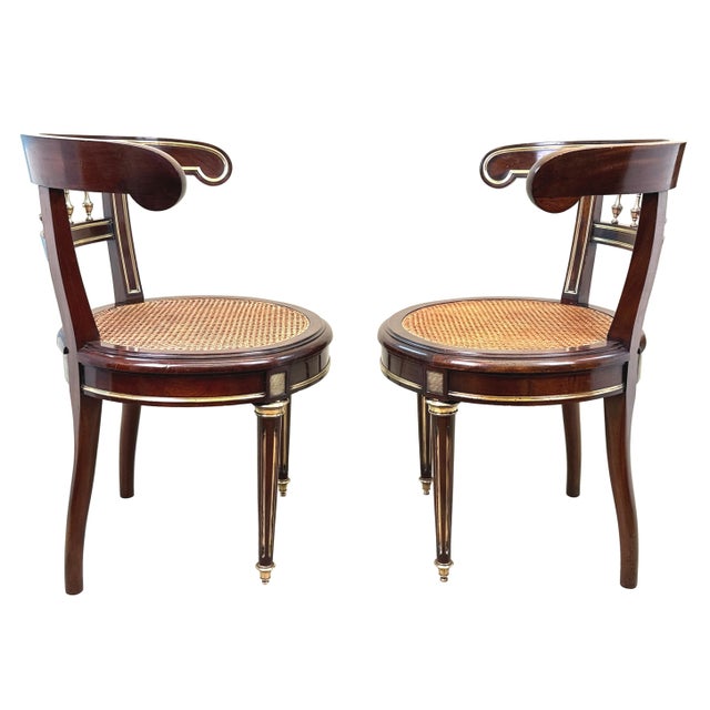 A very interesting pair of antique side chairs of french design from the end of the 19th century. They are exceptionally...