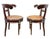 A very interesting pair of antique side chairs of french design from the end of the 19th century. They are exceptionally...