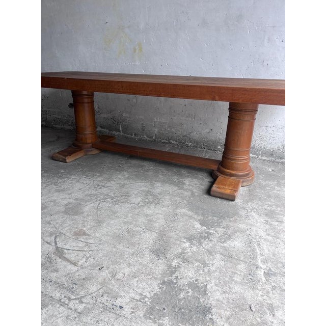 Impressive French Art Deco refectory table dating from around 1930, crafted in solid oak and characterised by its generous...