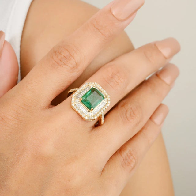 Estate Octagon Zimbabwe Emerald Engagement Ring with Diamonds in 14K Gold featuring natural emerald of 2.3 carats and...