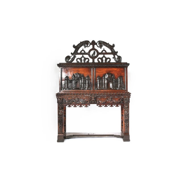 Highly hand carved 19th century mahogany wood sideboard or step back cabinet with two front drawers. The sideboard cabinet...