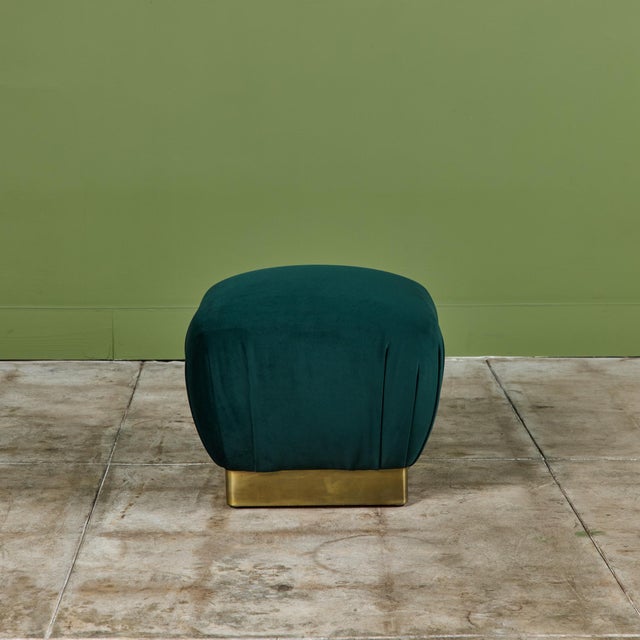 Pair of Marge Carson green velvet poufs, c.1970s, USA. The square ottoman features soft curves and is upholstered in a...
