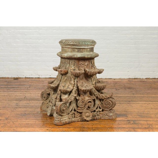 An antique Indian Corinthian temple capital from the 19th century, with distressed patina. Created to adorn the exterior...
