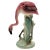Mid-century pink and green Drinking flamingo ceramic figurine. The statue detailed a pink flamingo with long legs, a slim,...