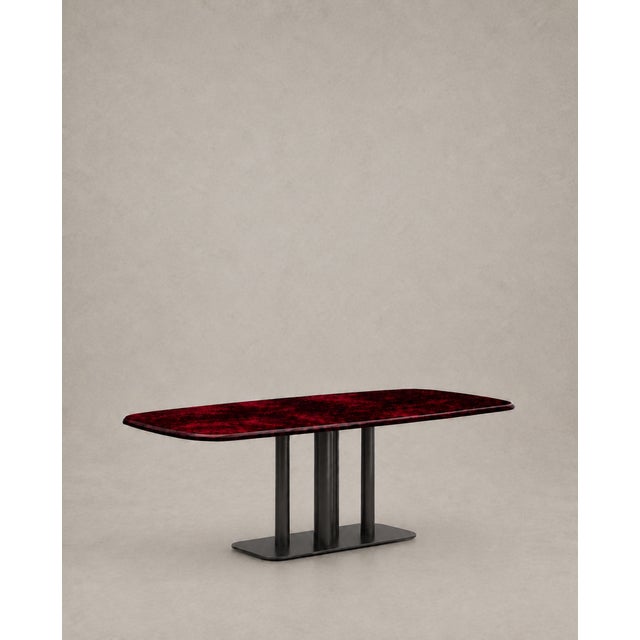 Sculptural dining table in smoked black epoxy resin and ruby ​​red mica A magnetic table, conceived as a sculptural...
