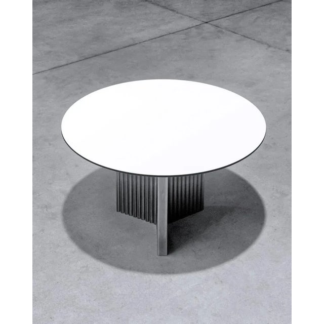 The T–T03 is one of the most iconic products by Temper. A wide and eccentric-looking table characterized by a 3-pointed...