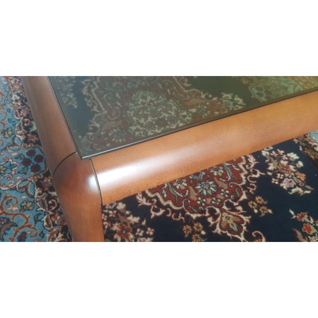 Vintage Coffee Table in Walnut, 1990s, in Flawless conditions. Designed 1990 to 1999 This piece is designed in the style...