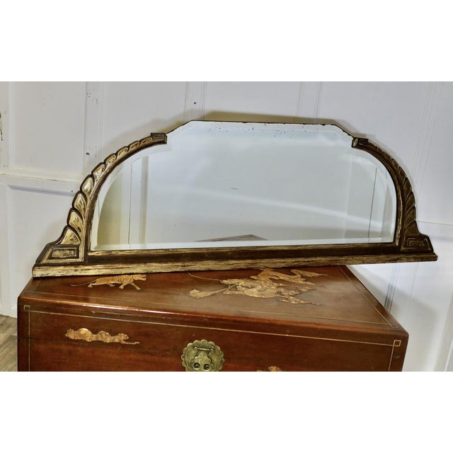 Long Art Deco Overmantel Mirror This Stylish Mirror is set in a Giltwood frame, the frame is open at the top showing the...