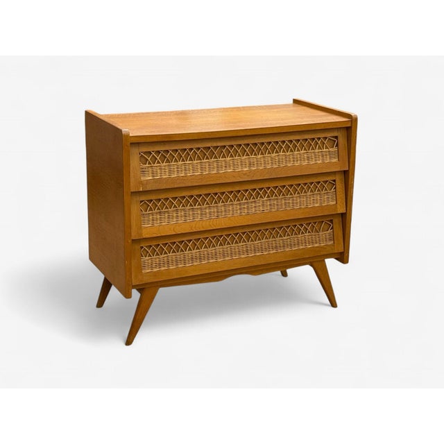 French Mid-Century Modern, Oak, Rattan, Chest of Drawers or Dresser, France, 1960s An organic modern chest of drawers...