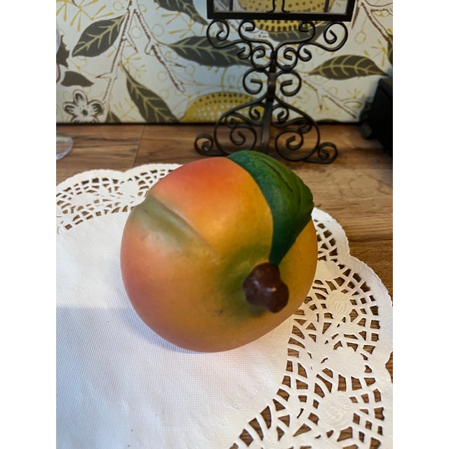 Up for consideration is a beautiful vintage ceramic hand painted peach. This is a lovely accent piece for your kitchen and...