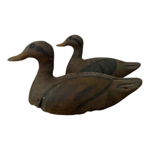 Pair of Hand-Carved Painted Wooden Duck Decoys, Traditional Hunting Lures, Early 20th Century.