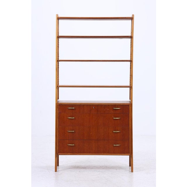 Product details beautiful vintage teak shelf from the 1960s features * timeless design * 3 shelves * 4 drawers with one...