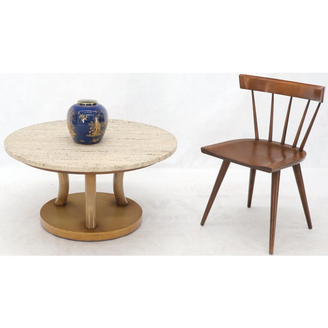 Mid-Century Modern round floating travertine top coffee table. Horn like base solid mahogany elements and finish. Gibbing...