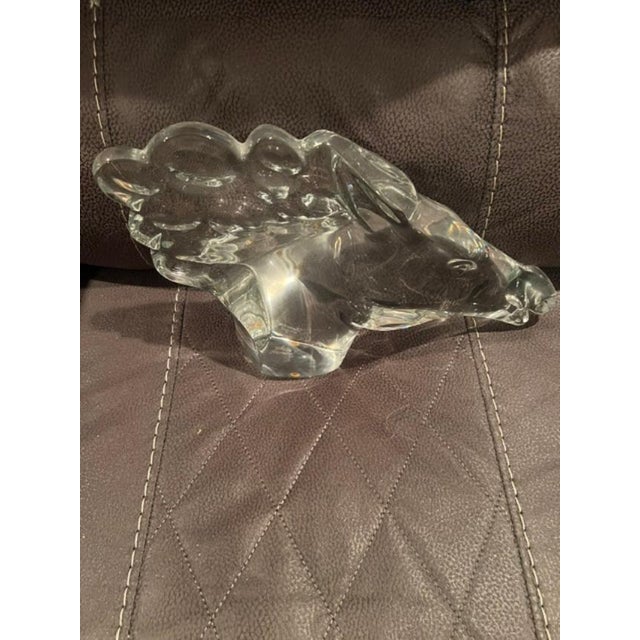 This elegant crystal sculpture features a stylized horse head design created by renowned designer Robert Rigot for...