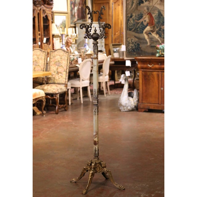 Bring refined French elegance to an entryway, dressing room, or bedroom with this striking antique hall tree. Crafted...