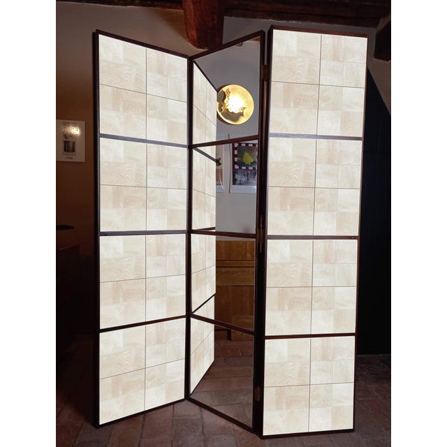 Square divider by Pietro Meccani. Designed in 1993, this beautiful screen is re-proposed by the Meccani Design company...