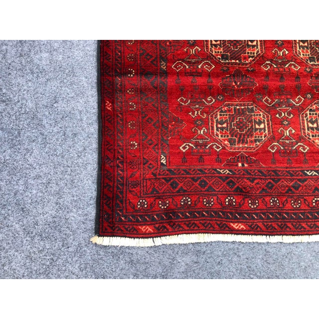 Size: 5'6 x 8'2 ft. This gorgeous hand knotted oriental Ersari pattern rug is made with 100% lambs wool. This rug will add...