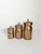 Charming set of three French copper kitchen canisters dating from the 1960s. Each cylindrical container features a gently...