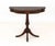 Neoclassical Style Mahogany Demilune Table, with three legs terminating in lion's paw feet. 32" H x 36" W x 15" D....