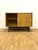 A vintage chest of drawers designed by Jiří Jiroutek in the 1960s, produced in Czechoslovakia. The piece reflects the...