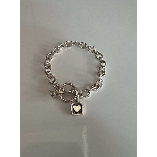 Arts & Crafts Chunky Sterling Silver Link Bracelet Featuring a Classic Tibetan Toggle Clasp and a Square Heart-Accented Charm For Sale - Image 3 of 6