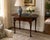 A finely crafted drop-leaf table by Kittinger, produced as part of their renowned Colonial Williamsburg collection....