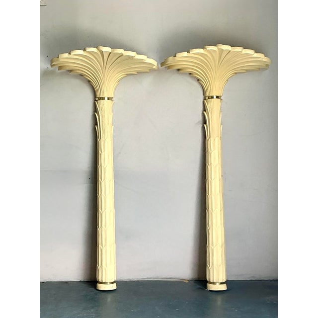 Channel the iconic glamour of French designer Serge Roche with this breathtaking pair of vintage palm tree torchere floor...