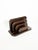 An elegant wooden desk letter holder, crafted from veneer with contrasting grain patterns that highlight the material's...
