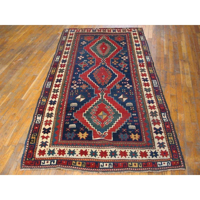 Antique Caucasian - Kazak rug, measures: 4'0" x 7'7".
