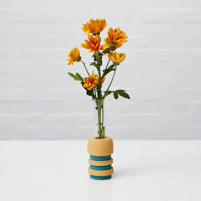 The LIO single stem vases have been turned by hand on a lathe from blocks of laminated Linoleum flooring. These lively yet...