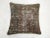 Pillow made from an antique Persian Heriz rug. 17'' x 18''. zipper closure and poly-fill provided. backed in blue cotton