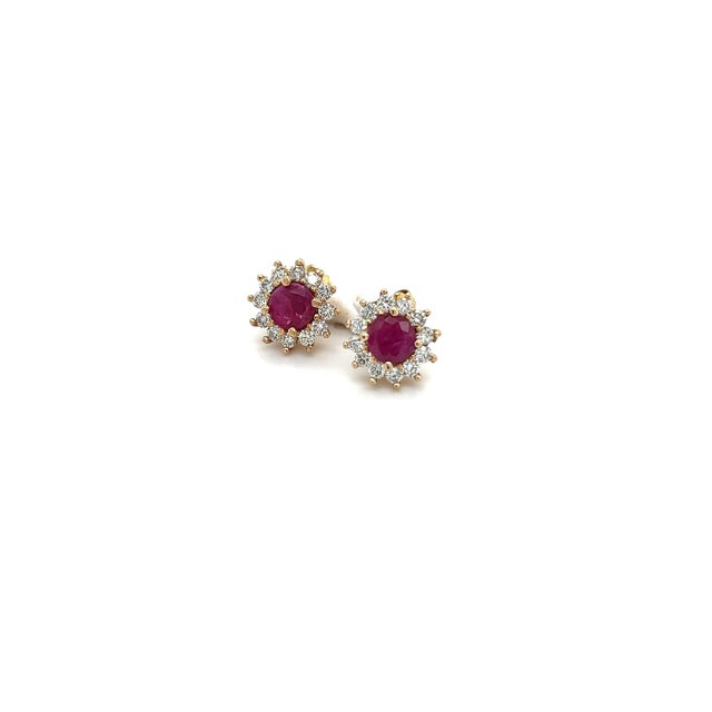 Natural Ruby and Diamond halo Earrings set in 14k Yellow Gold with 2.20 TCW Certified $2,595 121103 This is a one of a...