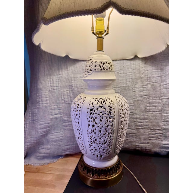 Bring timeless elegance and textural charm to your space with this striking pair of vintage Hollywood Regency style table...