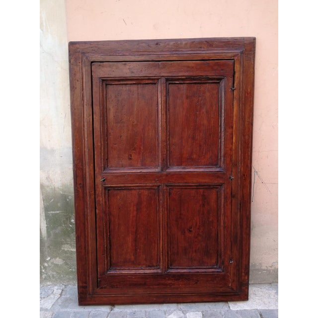 Splendid wall cabinet from the Umbrian region, made of poplar wood in the second half of the 17th century. The cabinet...