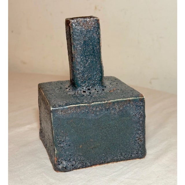 Up for sale is a stunning vintage original squared green brutalist pottery vase. It features a unique thick green glazed...