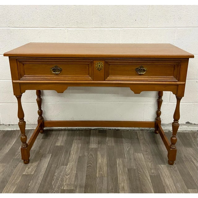 This is a gorgeous vintage Colonial style sideboard, buffet, server, or hall table. Features one large drawer, turned...