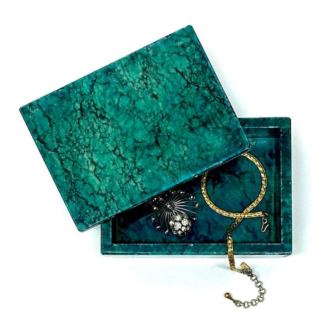 This is a rare and gorgeous piece that we believe to be a malachite jewelry or trinket box. It is likely sealed with an...
