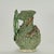 Whimsical 19th century Portuguese earthenware pitcher crafted in an eccentric composition with lizards and frogs on a...