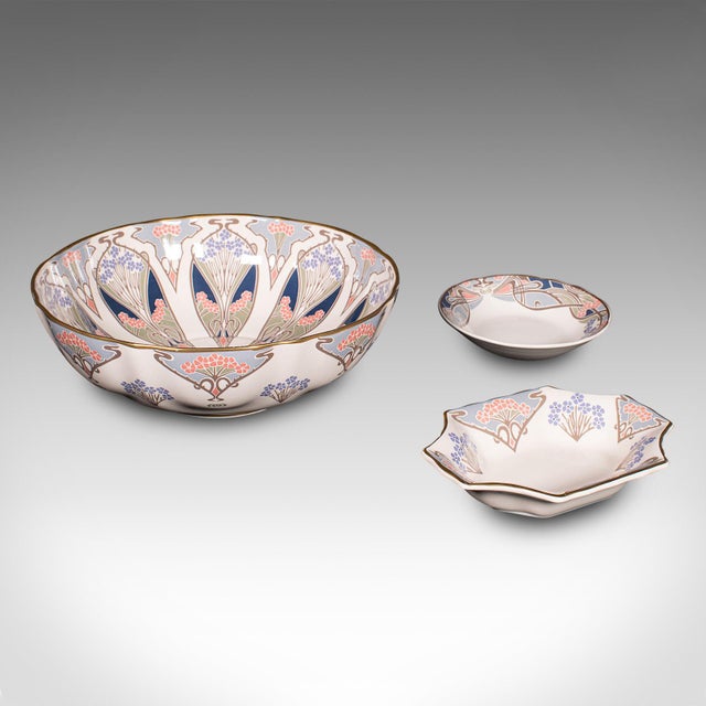 This is a vintage Liberty of London serving set. An English, ceramic decorative service, dating to the late 20th century,...